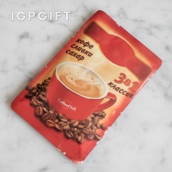กล่องกาแฟบดและผ้าเช็ดตัว